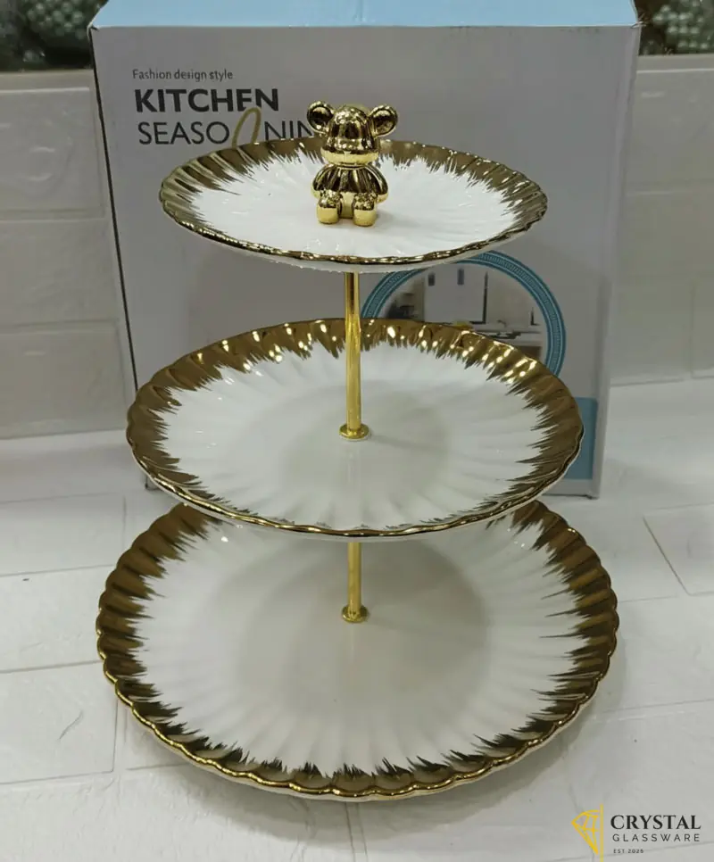 3-tier white ceramic cake stand with gold accents